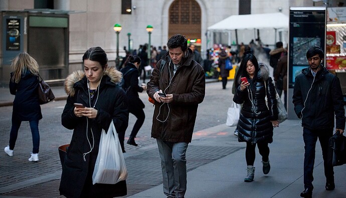 People on Smartphones, Walking, Heads Bent