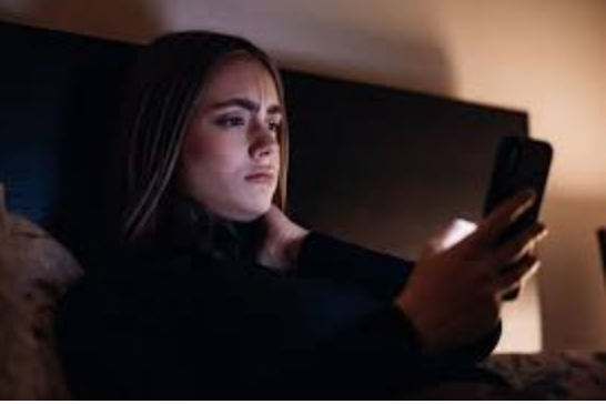 Resting Bitch Face girl with phone