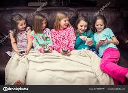 Happy Young Girls on Smartphones